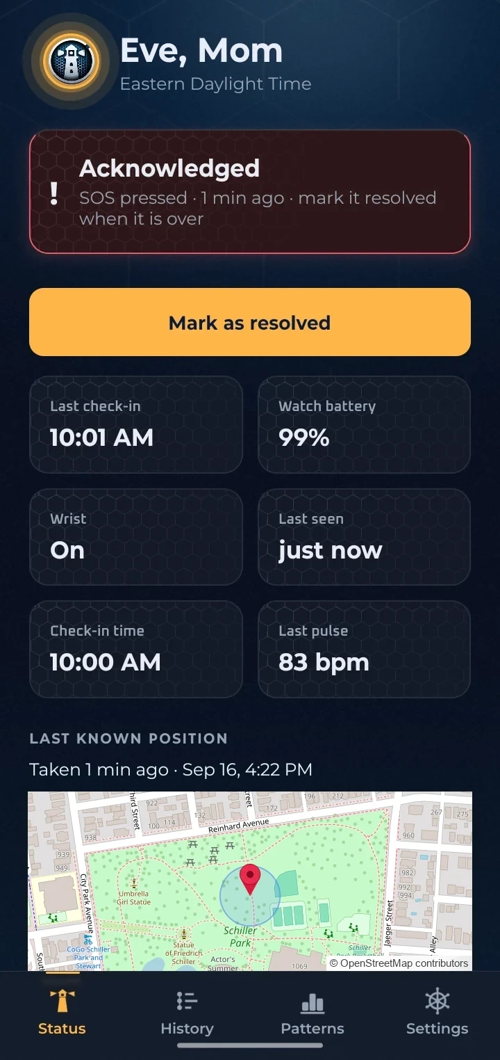 The phone after the alert was acknowledged, with a Mark as resolved button, watch battery 99 percent, on the wrist, last seen just now and a pulse of 83 bpm